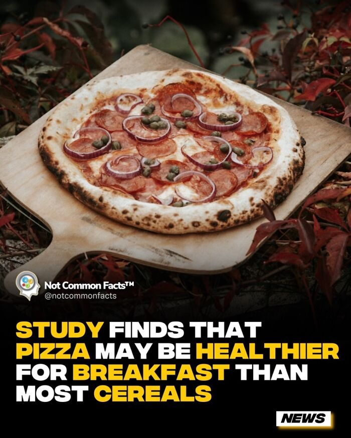 Pizza on a wooden board outdoors, with text suggesting it's healthier for breakfast than cereals.