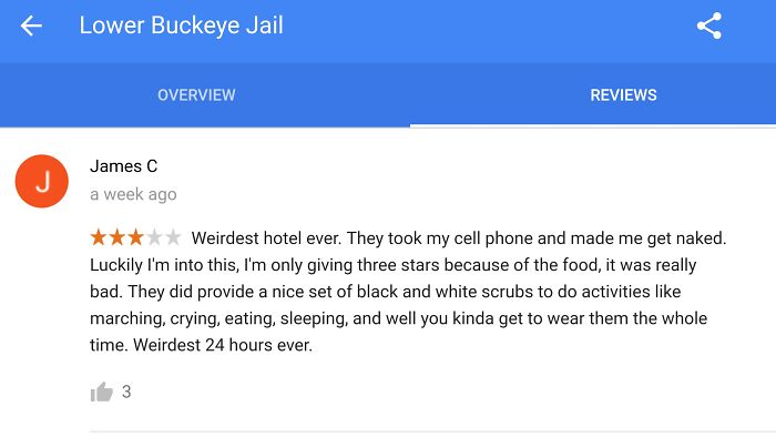 Funny review of a jail as a hotel with a three-star rating, noting weird experiences and activities like marching and crying.