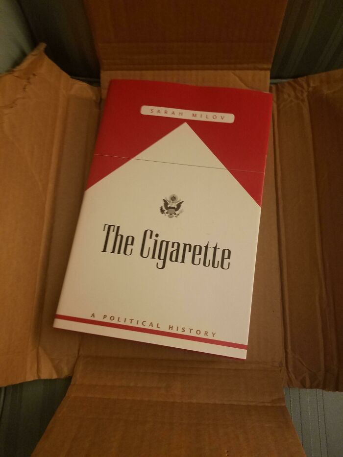 Oversized cigarette pack book cover showing online shopping scam fail.