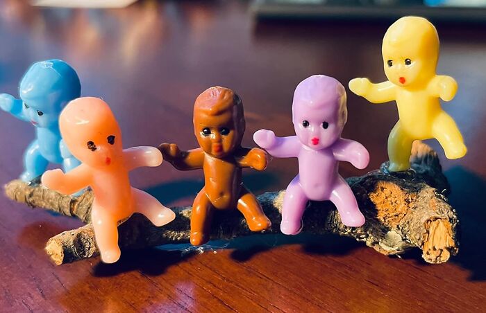 Colorful plastic figurines on a stick, exemplifying the funniest Amazon finds.