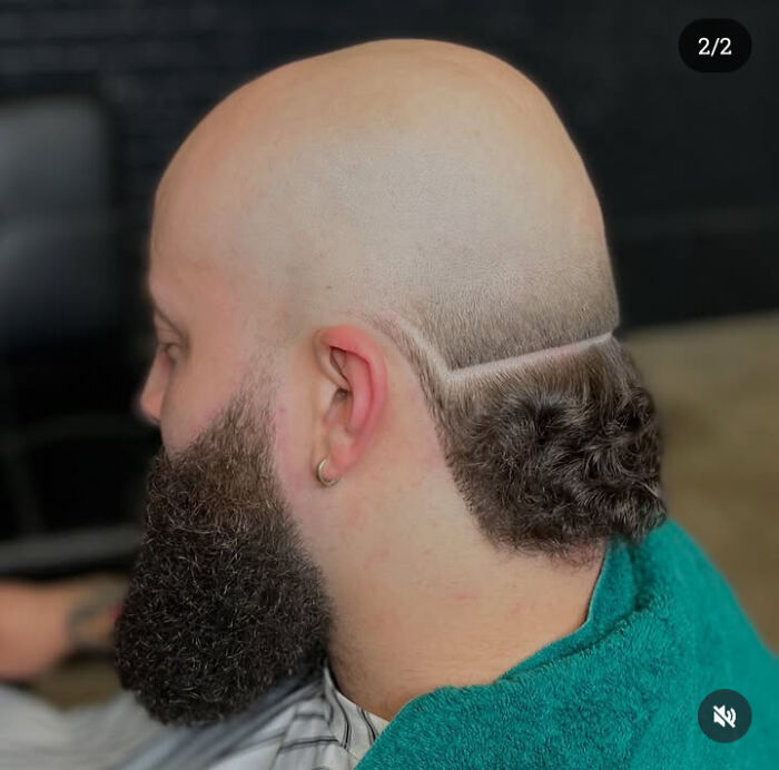 Man with an unusual haircut showing awful taste but great e*******n, featuring a sharp line and curly hair patch.