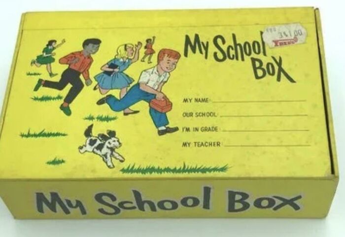 Vintage school box with colorful illustrations, evoking old-school memories.