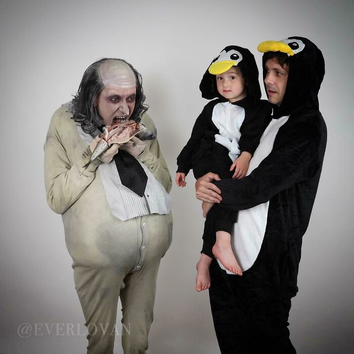 Adults and child in penguin-themed costumes, showcasing hilarious misunderstandings.