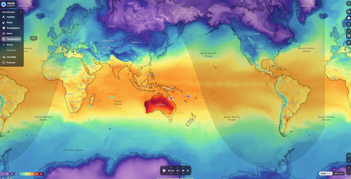 Colorful world map highlighting temperature variations, with Australia prominently displayed in red, symbolizing high temperatures.
