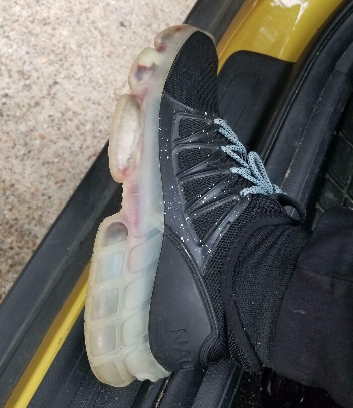 Low-quality item with a damaged, transparent shoe sole, highlighting consumer disappointment.
