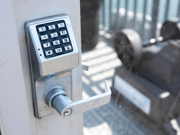 Keypad lock on a door, illustrating affordable solutions to make life easier.