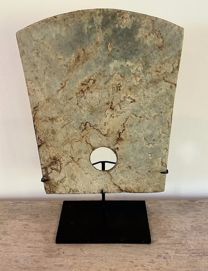 Marble sculpture on display with luxury influencer themes.