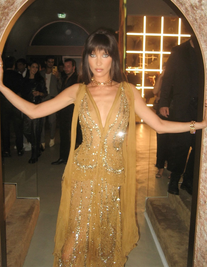 Bella Hadid's Tiny Red String Bikini In Snow Is Raising The Temperature Bella Hadid's Tiny Red String Bikini In Snow Is Raising The Temperature