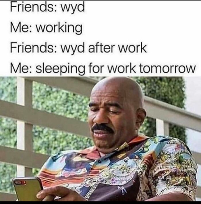 Man with mustache looking at phone, funny meme about working in an office and prioritizing sleep for work.