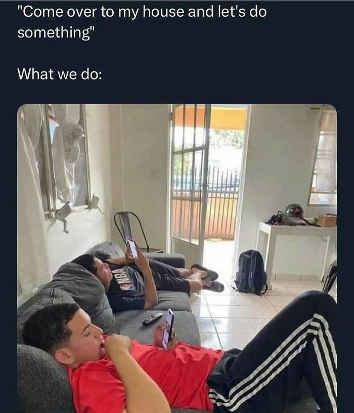 Two friends lounging on a couch, each absorbed in their phones, depicting a hilariously random meme moment.