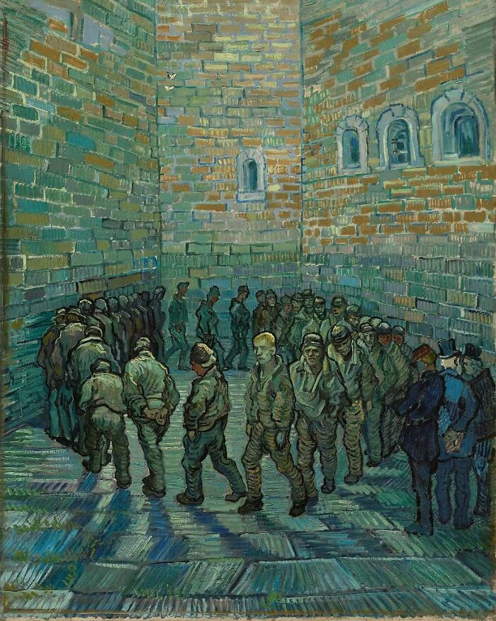 "Prisoners walking in a courtyard, depicting a historic scene with individuals in a somber setting."