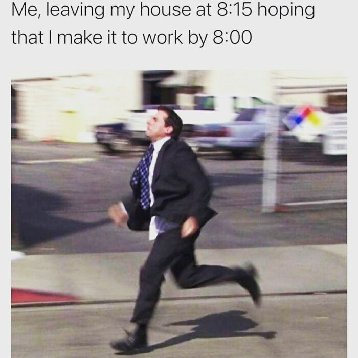 Man in business attire sprinting late, humorously depicting an office work scenario.