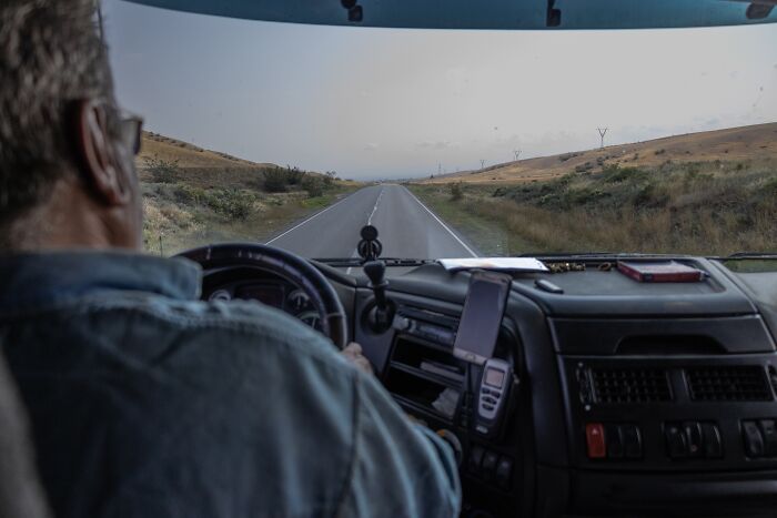 View from inside a vehicle on a deserted road, showcasing a scene related to Tokyo International Foto Awards.