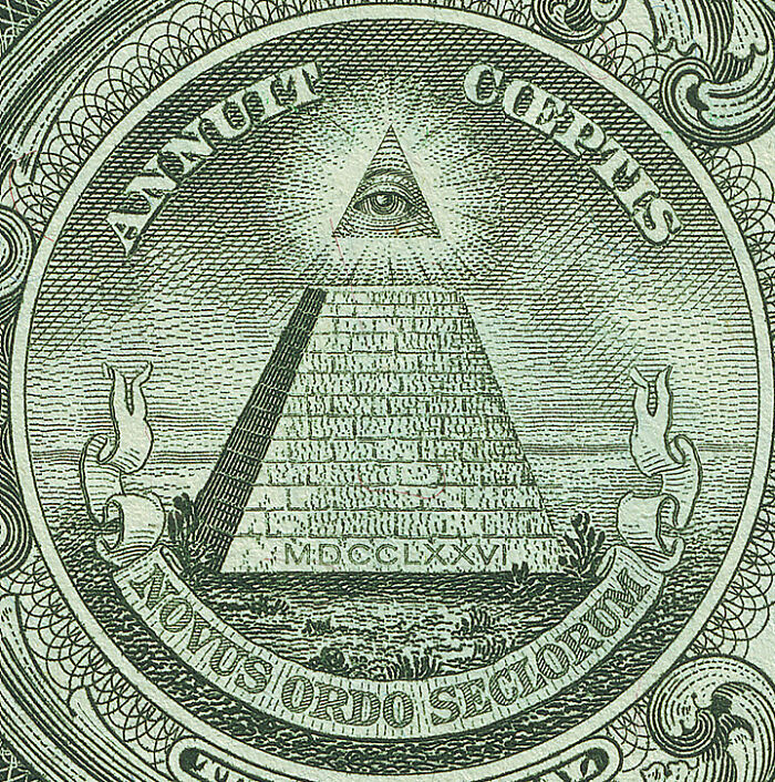 All-seeing eye atop pyramid, symbolizing overlooked historical events on US currency.