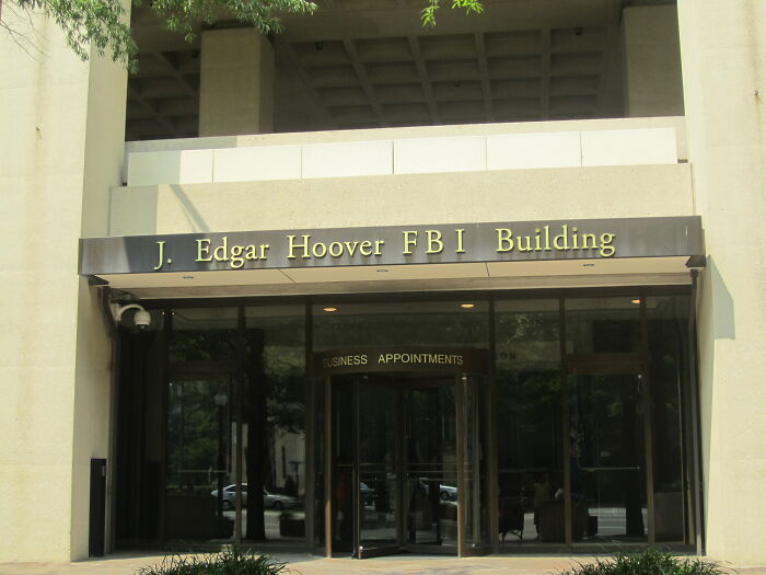 Entrance of J. Edgar Hoover FBI Building, a hub for investigations into weird unsolved mysteries.