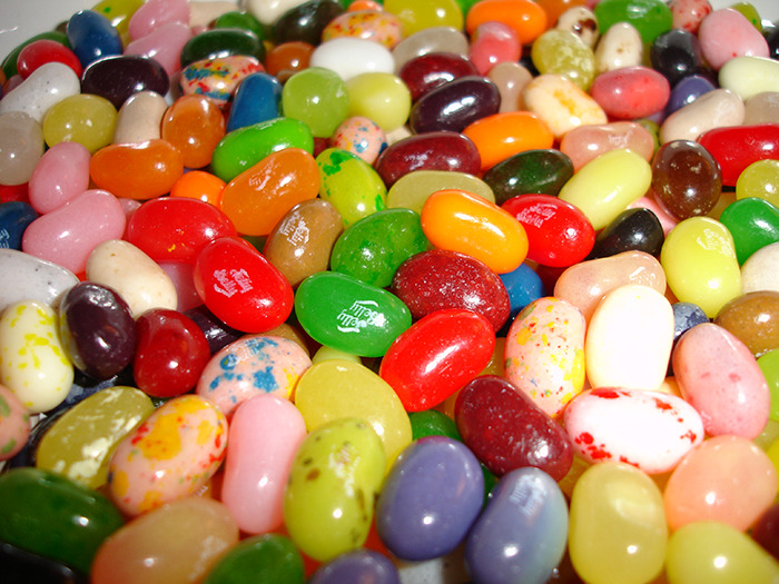 Colorful jelly beans containing Red Dye No. 3, showcasing various vibrant hues commonly found in candies.