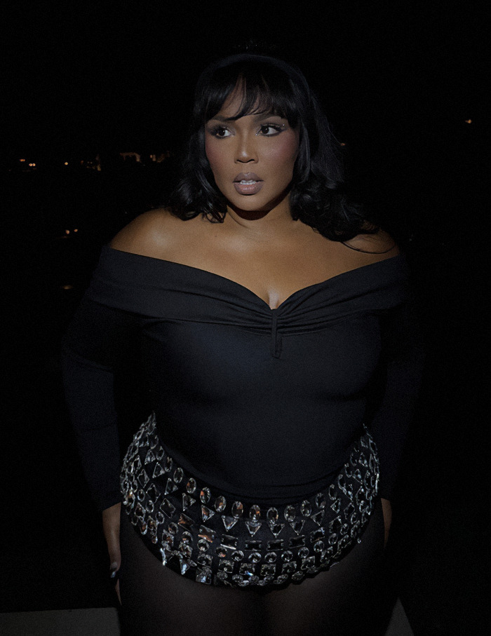 Lizzo in a stylish outfit, confidently flaunting weight loss. Lizzo in a stylish outfit, confidently flaunting weight loss.