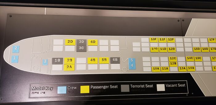 Airplane seating chart highlighting a "terrorist seat," sparking controversial conspiracy theories discussions.