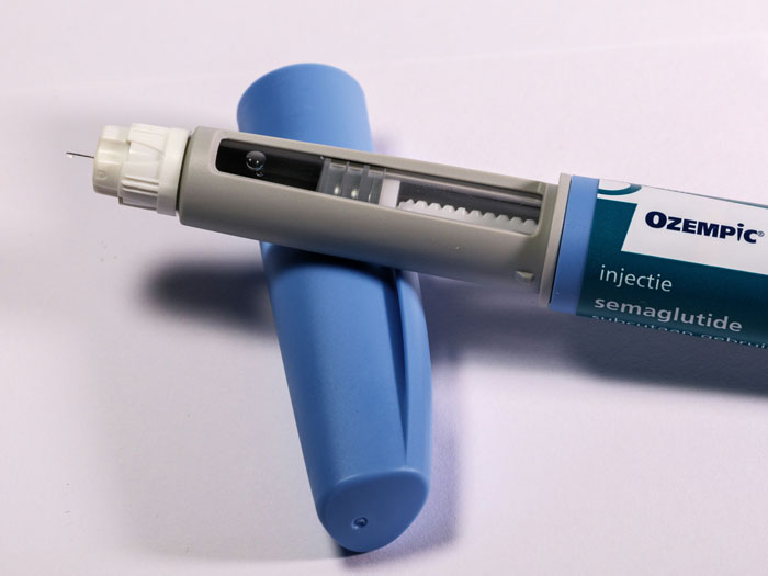 Ozempic injection pen, highlighting Hollywood beauty trends controversy. Ozempic injection pen, highlighting Hollywood beauty trends controversy.