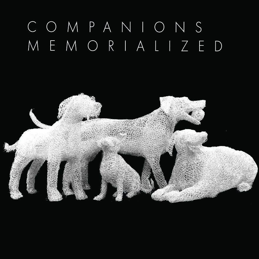 Chicken wire sculptures of five dogs against a black background labeled "Companions Memorialized."