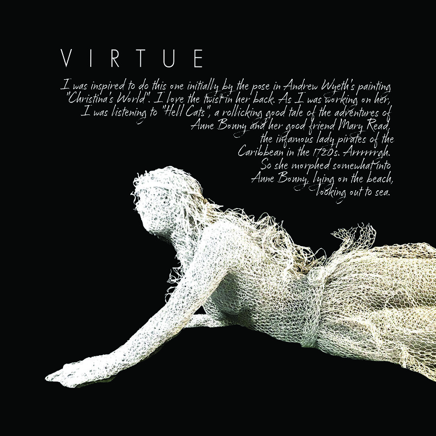 Chicken wire sculpture of a reclining figure titled "Virtue" with text in the background.