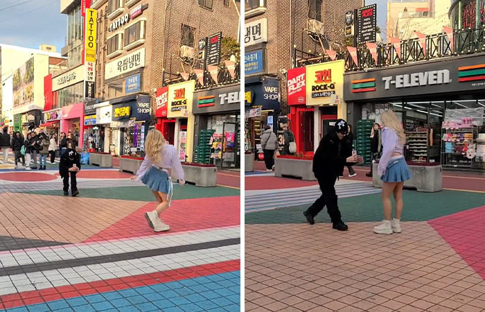 Street scene with two people interacting, highlighting influencer culture in 2024.