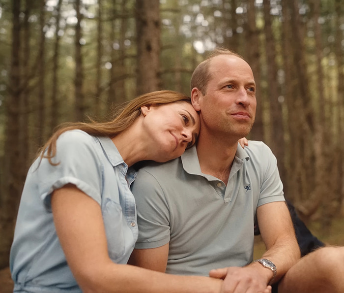 Kate Middleton and Prince William sitting outdoors.