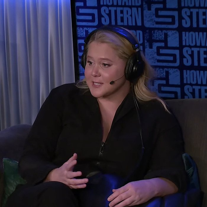 Amy Schumer discussing her Ozempic experience on a radio show, wearing headphones and a black outfit.