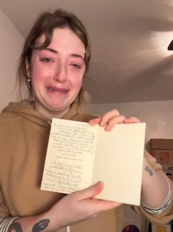 Madison Vaughan tearfully holds a letter, emotional after farewell with longtime mailman before moving out. Madison Vaughan tearfully holds a letter, emotional after farewell with longtime mailman before moving out.