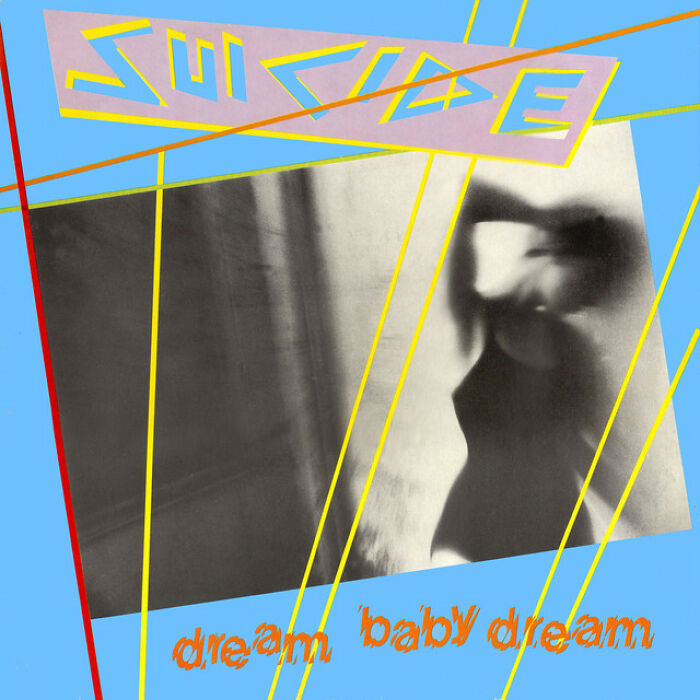 '70s album cover of "Dream Baby Dream" by S*****e, featuring abstract art and bold colors.