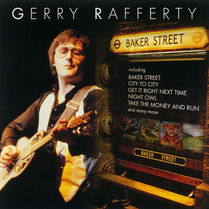 Gerry Rafferty playing guitar on the iconic '70s album cover for "Baker Street."