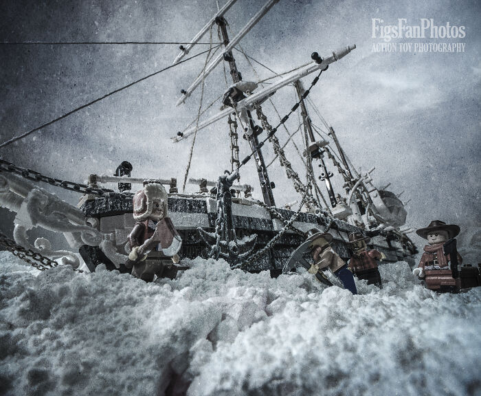 LEGO scene depicting an Antarctic expedition with a ship and figures in snowy conditions.