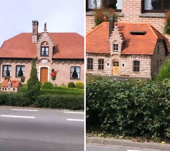 A hilariously bad house with a small replica in front, featuring red roof and brick design.
