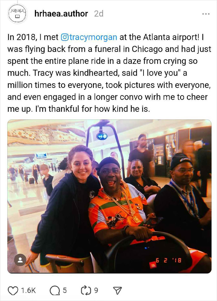 Person posing with a celebrity at an airport, smiling and enjoying the moment.