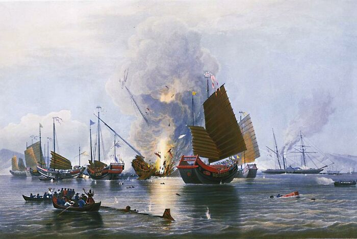 Historical naval battle scene with traditional ships and an explosion, illustrating facts about the past not taught in school.