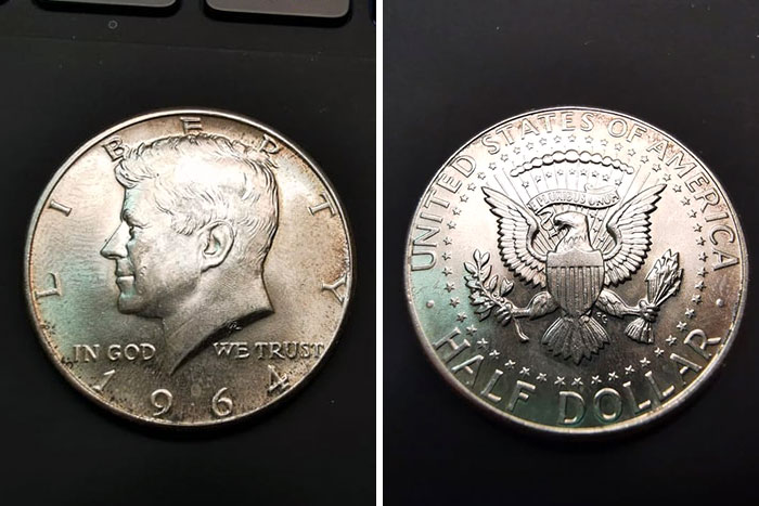 1964 Kennedy half dollar coin, showing obverse with profile and reverse with eagle, a treasure for numismatists.
