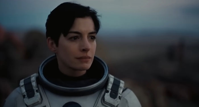 Astronaut gazing into the distance, conveying a sad movie ending.