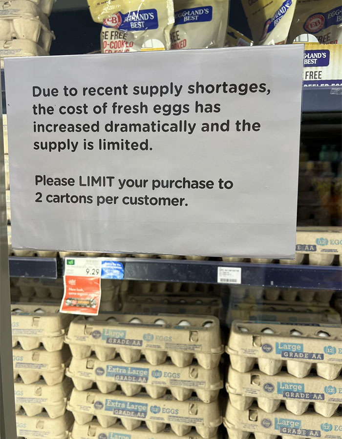 Notice in a store limiting egg purchases due to record-high egg prices and supply shortages in the US.