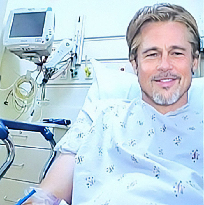 A man in a hospital gown, resembling a celebrity, in a hospital room with medical equipment. A man in a hospital gown, resembling a celebrity, in a hospital room with medical equipment.