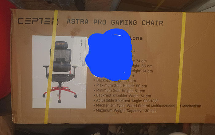 Box labeled "Astra Pro Gaming Chair" with specs, part of funny online shopping scams and fails.