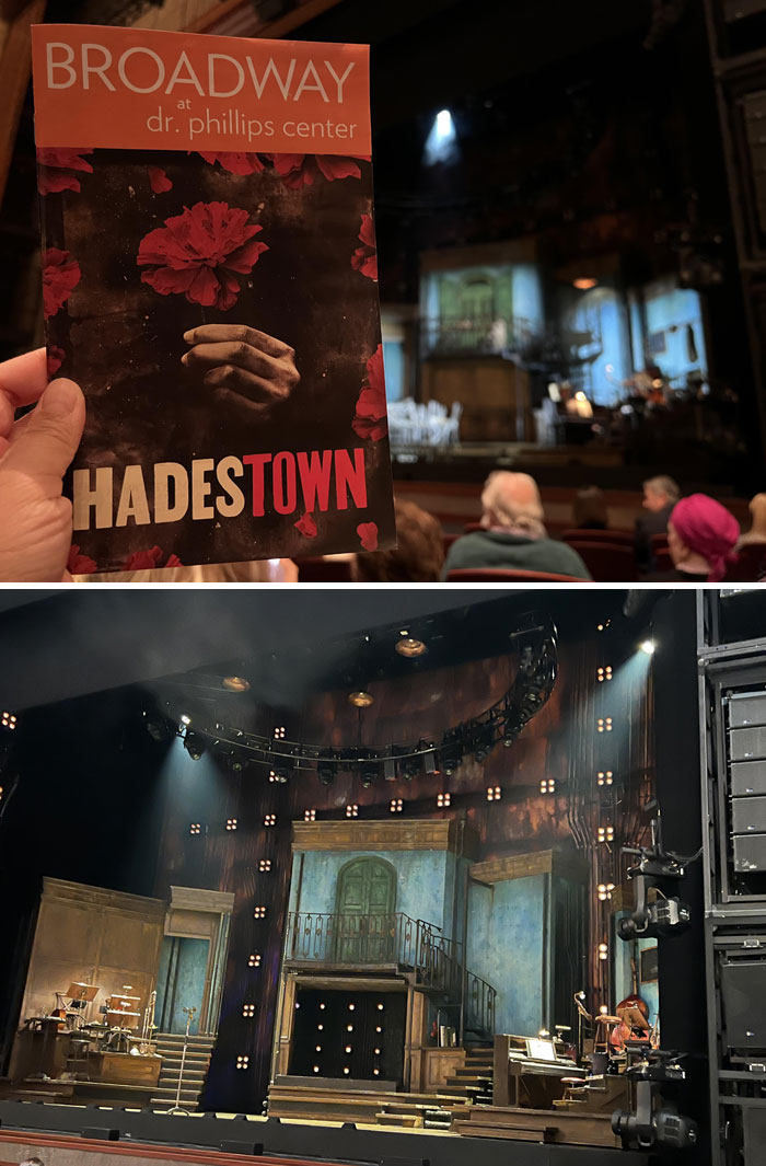 Hadestown playbill held up in a theater, highlighting a funny-wholesome-anniversary-surprise experience.
