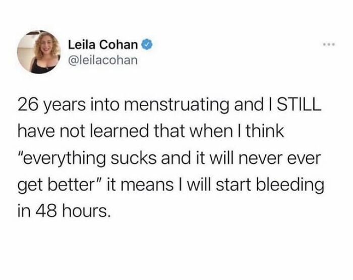 Tweet humorously discussing menstruation and the realization patterns over 26 years.