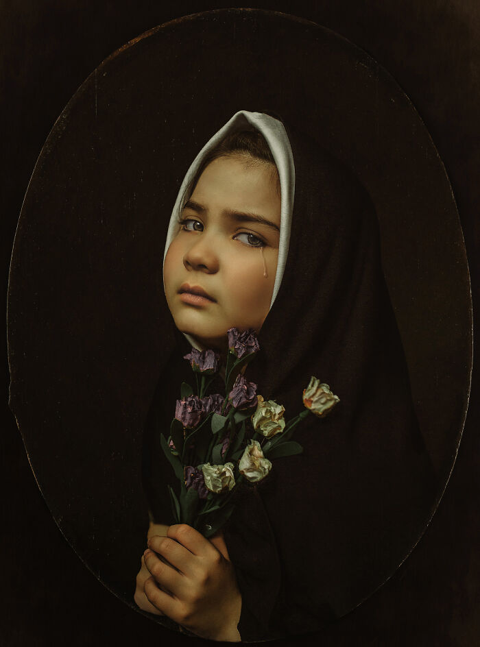 Child holding flowers, with a worried expression, in a creatively styled portrait to help battle depression after divorce.