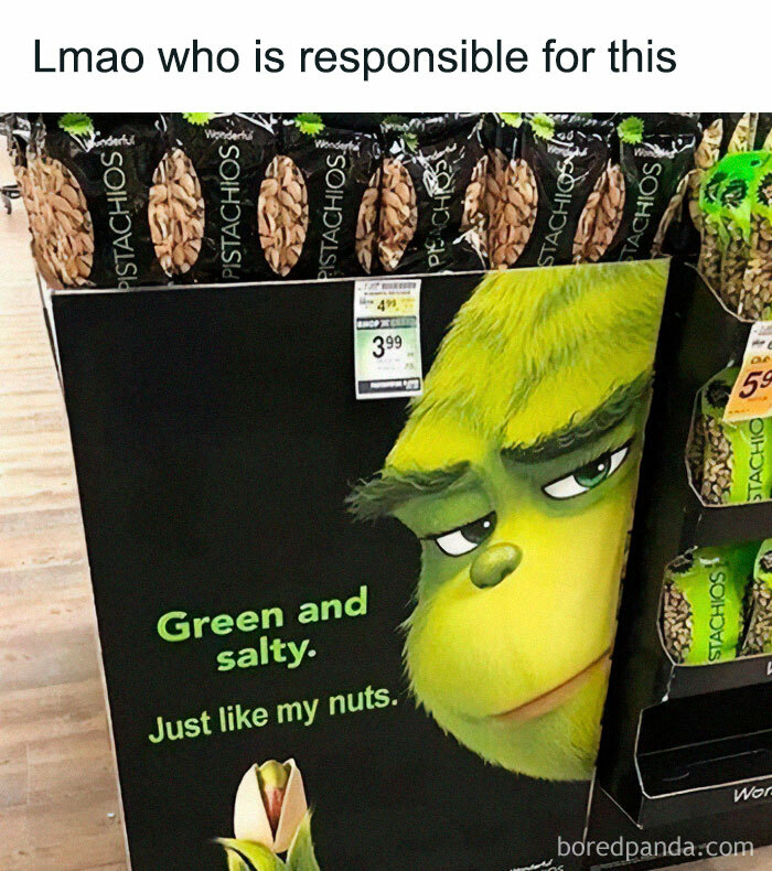 Display of pistachios with a humorous Grinch-themed sign; hilarious random meme content.