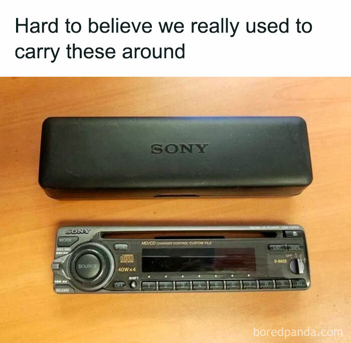 Sony car stereo from the past, reminding us of our childhood, placed on a wooden table.