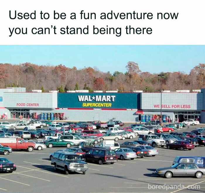 Walmart Supercenter with parked cars, evoking childhood memories.