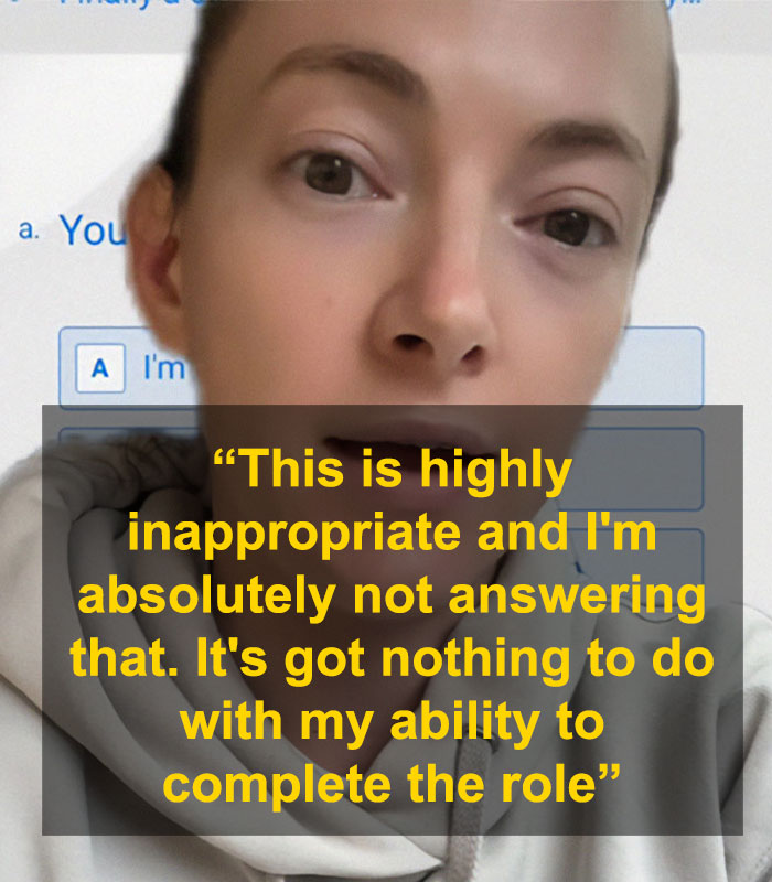 Woman expressing frustration over CEO's relationship question during a job interview.