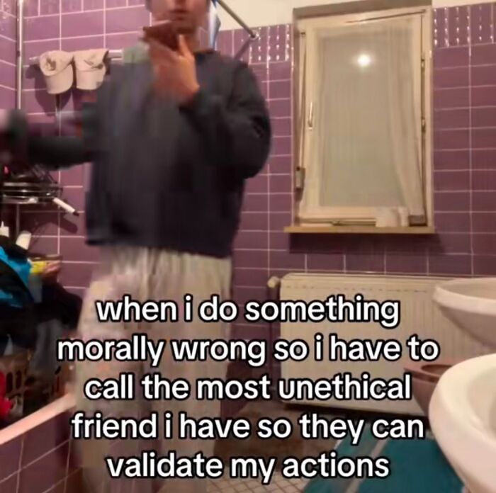 Person in a bathroom with text overlay on a funny meme.