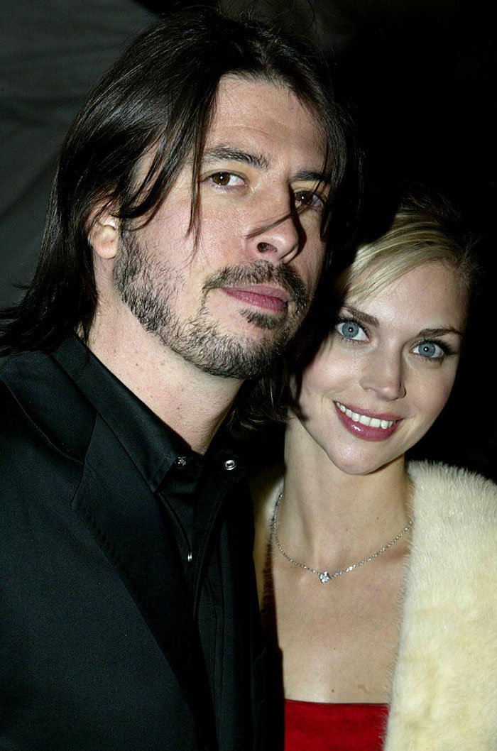 A couple in formal attire, highlighting Jordyn Blum, Dave Grohl&rsquo;s wife, attending an event.