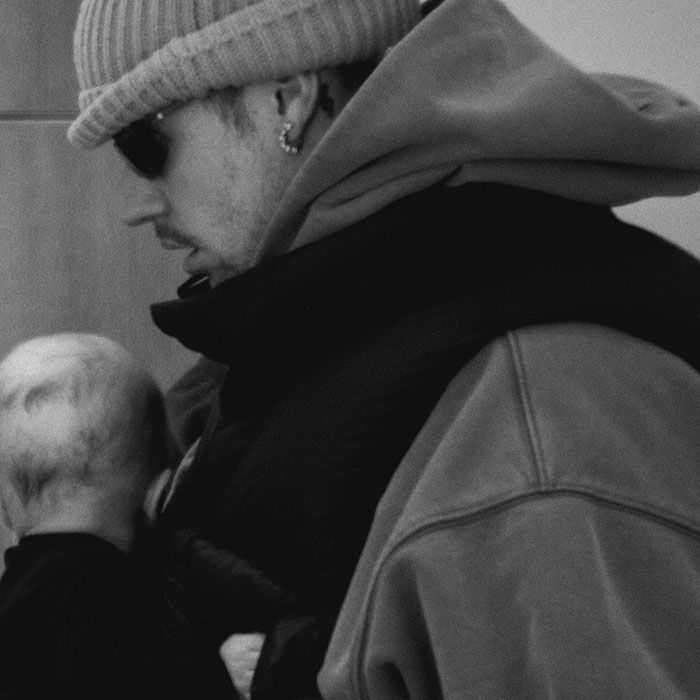 Hailey Bieber shares image with Justin, wearing a beanie and hoodie, in a candid moment after the social media surprise. Hailey Bieber shares image with Justin, wearing a beanie and hoodie, in a candid moment after the social media surprise.